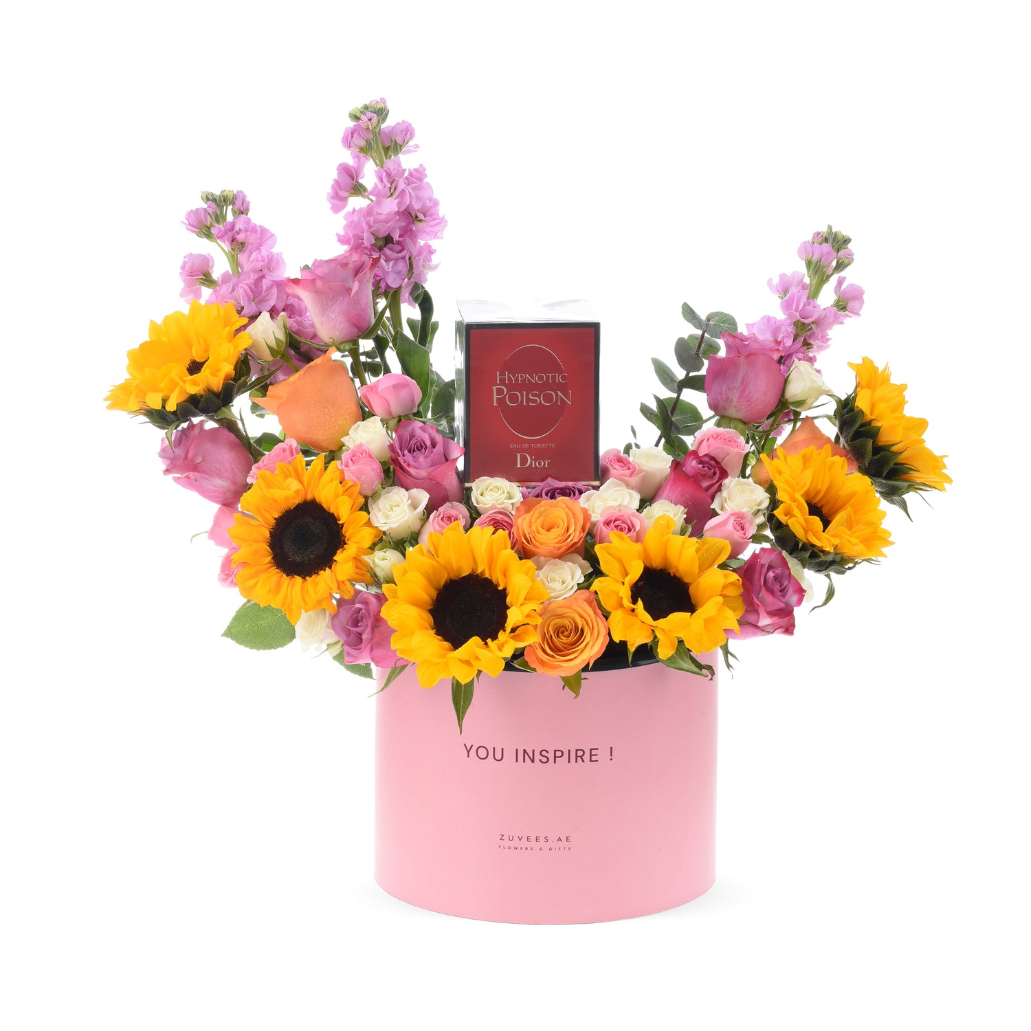 Vibrant sunflowers, pink roses, and Dior perfume in a pink "YOU INSPIRE!" gift box.