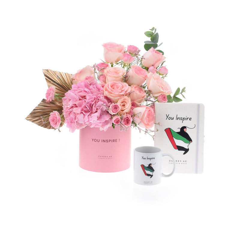 Pink roses, hydrangeas in "You Inspire" box with matching mug, notebook, UAE flag design.