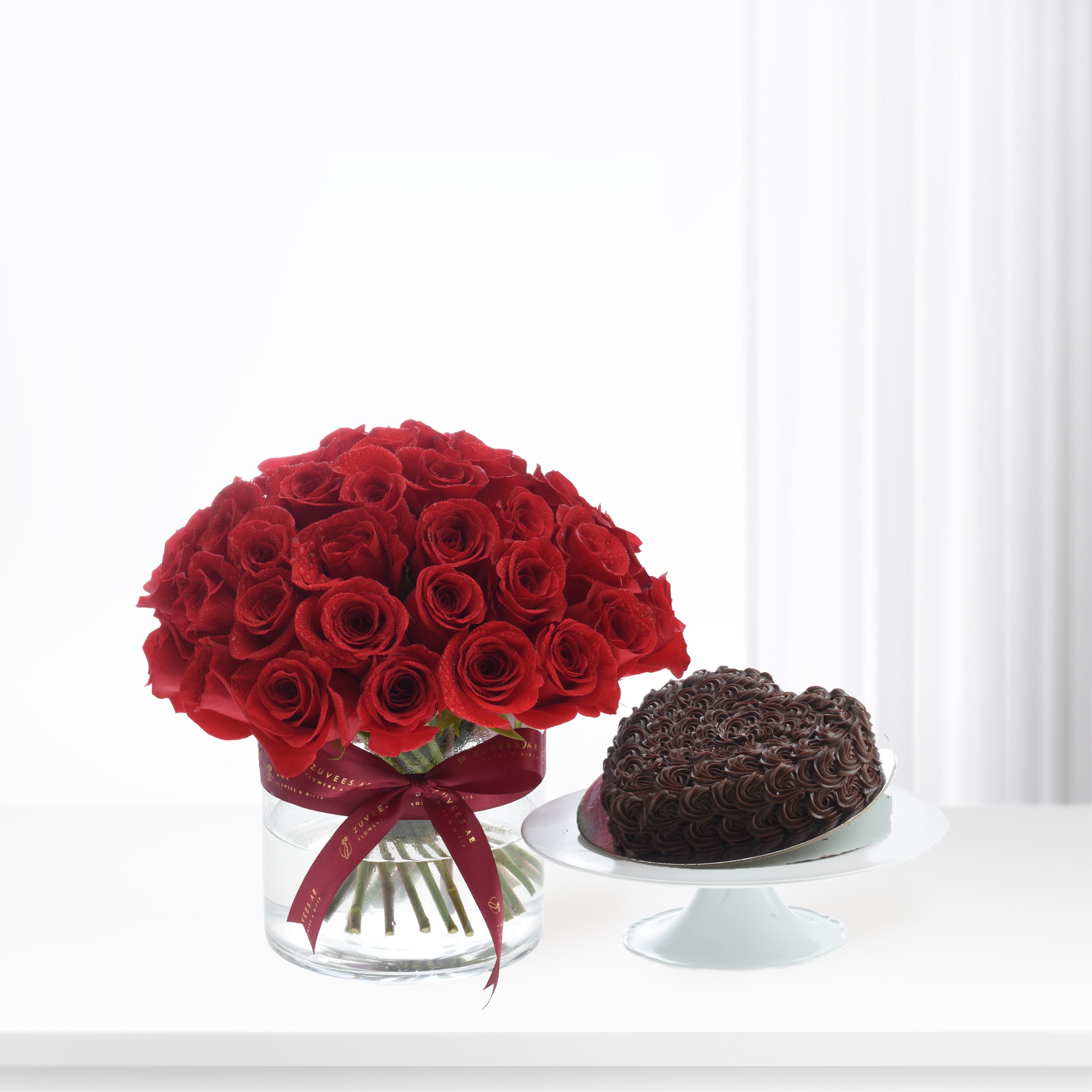 51 Roses in Red Aura Glass Vase Cake Combo - Zuvees.ae