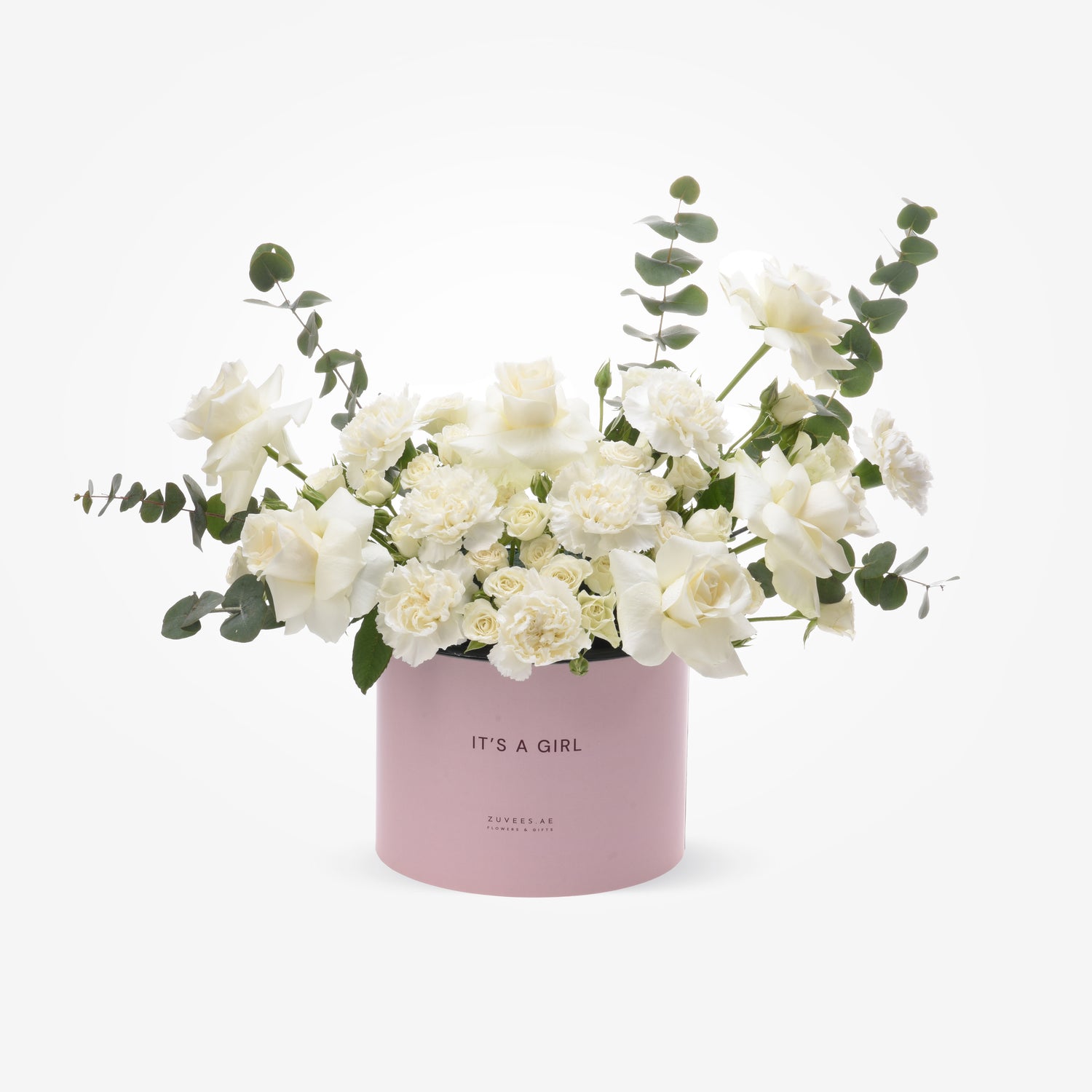 Soft pink box holds lush white roses and eucalyptus, celebrating "It&